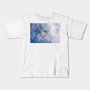 White seagull flying in bright blue sky Kids T-Shirt